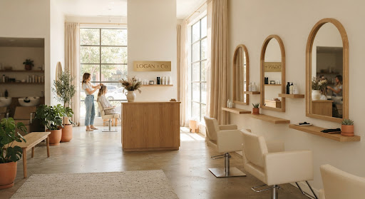Warm sunlight filling a high-end minimalist salon interior in Barrio Logan San